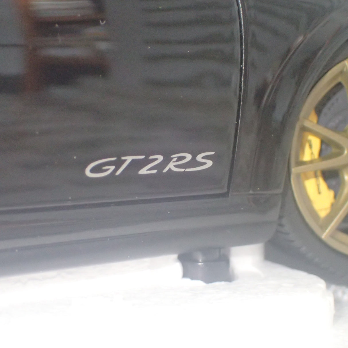 MINICHAMPS 100 069402 - 1/18 SCALE Diecast PORSCHE 911 (997 II) GT2 RS 2011 BLACK W/ GOLD WHEELS