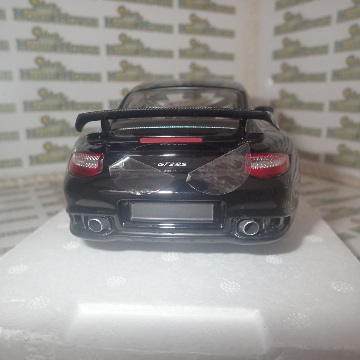 MINICHAMPS 100 069402 - 1/18 SCALE Diecast PORSCHE 911 (997 II) GT2 RS 2011 BLACK W/ GOLD WHEELS