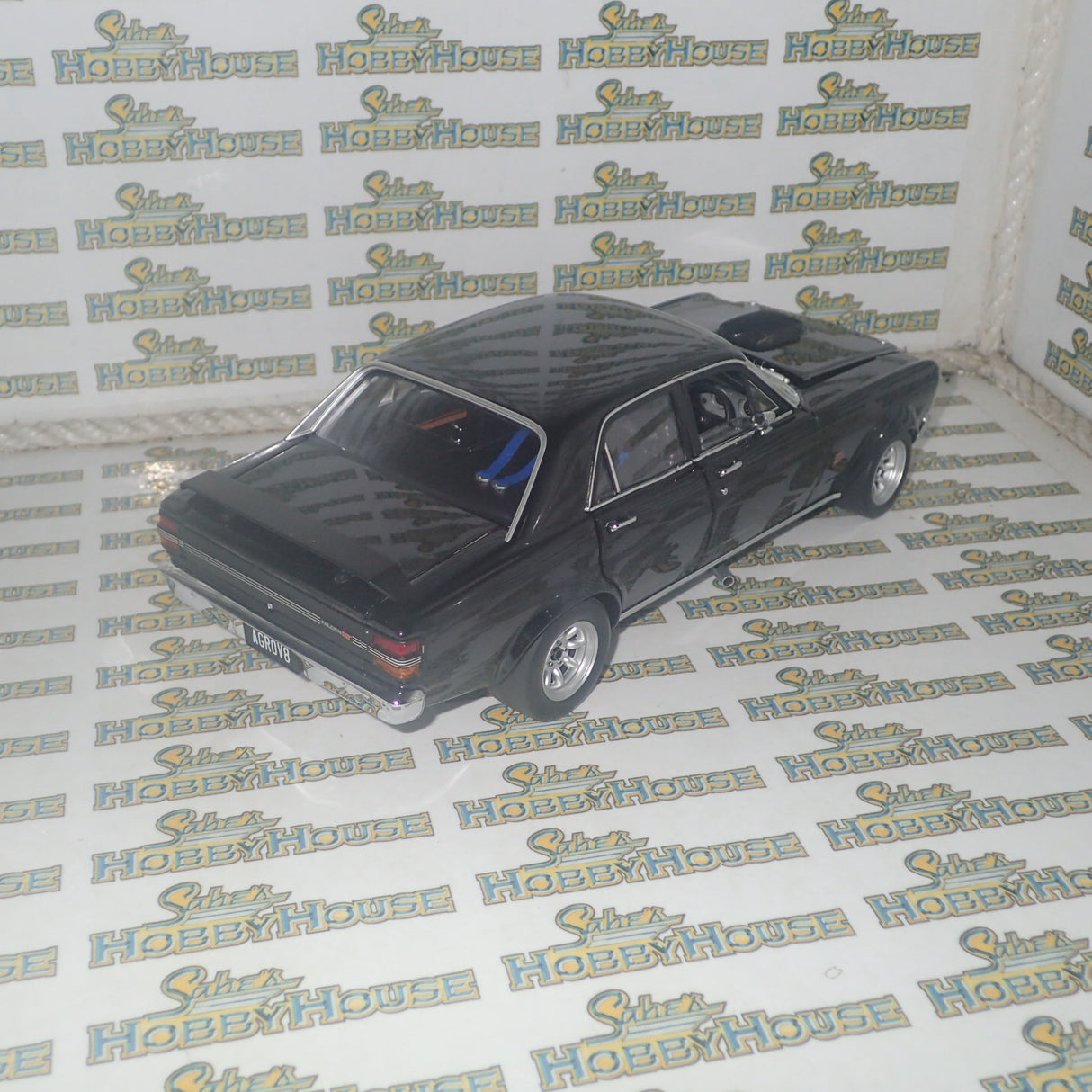 CLASSIC CARLECTABLES 18529 - 1:18 SCALE FORD GT-HO SUPER FALCON GLOSS BLACK DIECAST REPLICA