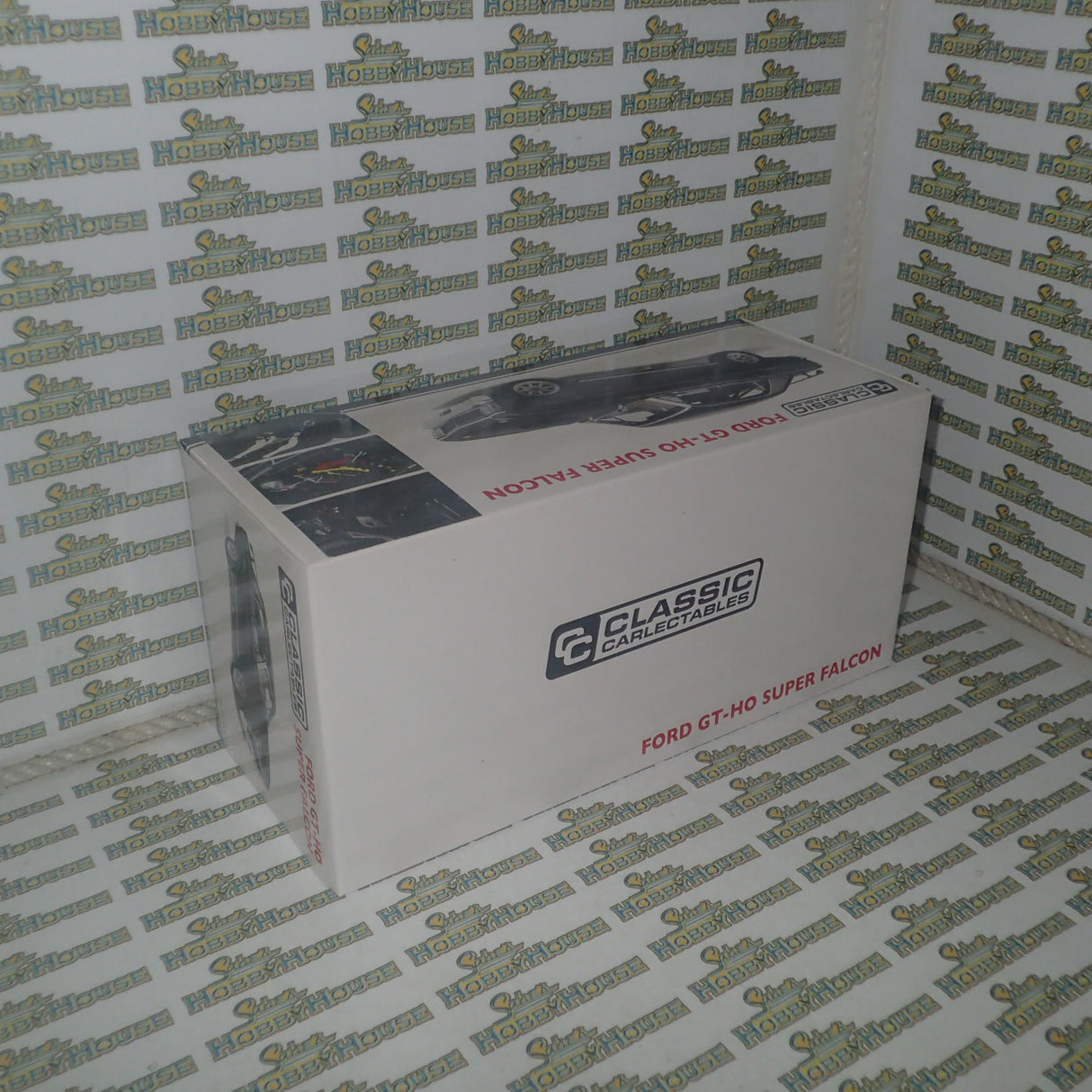 CLASSIC CARLECTABLES 18529 - 1:18 SCALE FORD GT-HO SUPER FALCON GLOSS BLACK DIECAST REPLICA