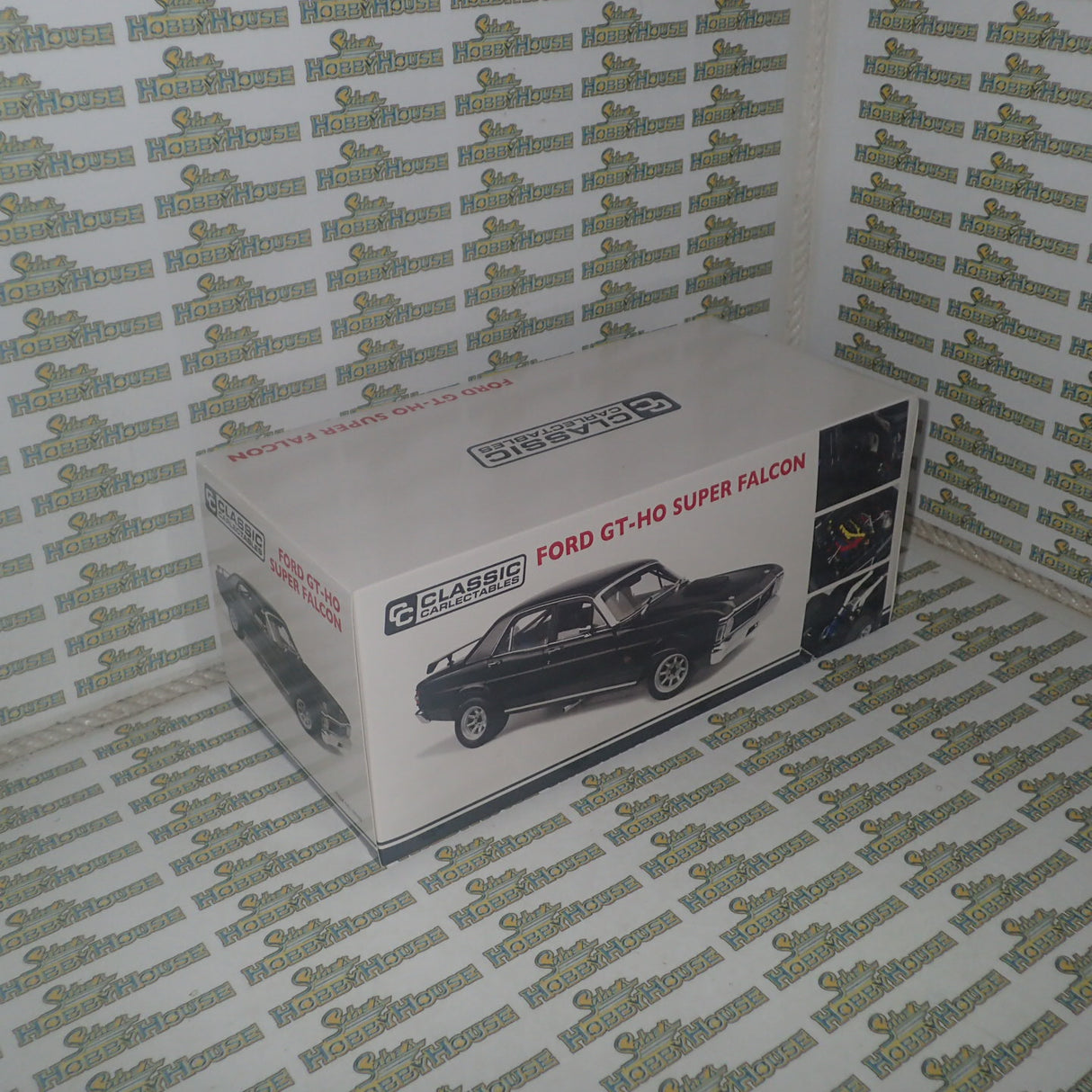 CLASSIC CARLECTABLES 18529 - 1:18 SCALE FORD GT-HO SUPER FALCON GLOSS BLACK DIECAST REPLICA