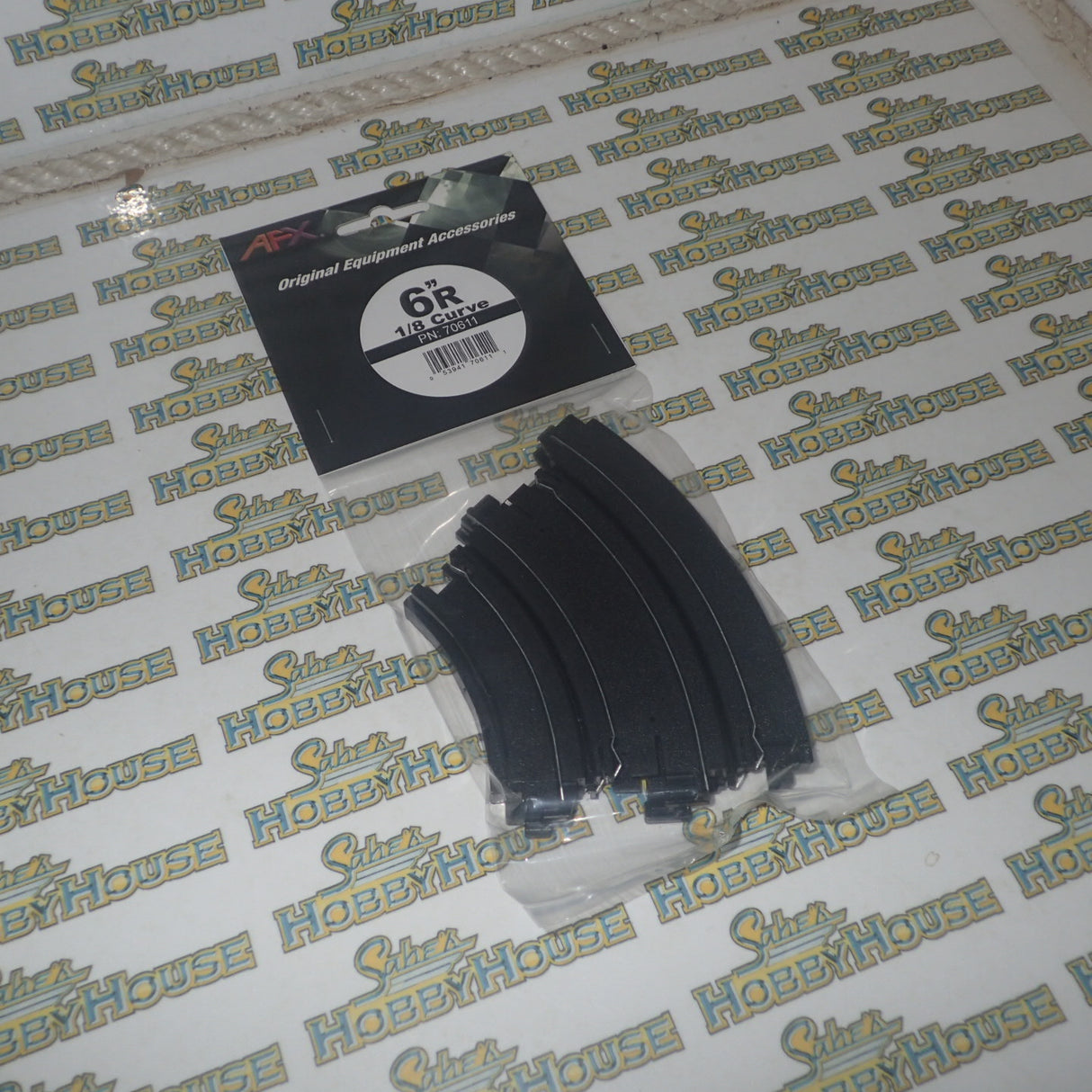 AFX 70611 - Curve, 6" Radius Dealer button-trans 1/8 Circle (45 Degree) Track