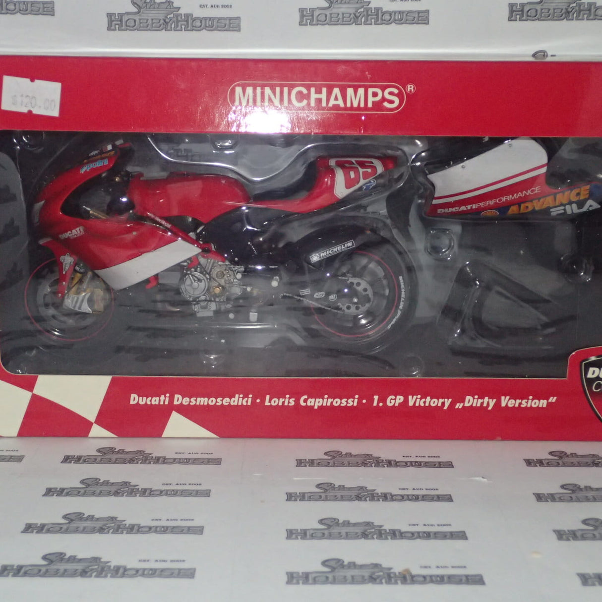MINICHAMPS 122 031495 -D 1/12 DUCATI DESMO 16 1.GP VICTORY 'DIRT' L.CAPIROSSI 2003