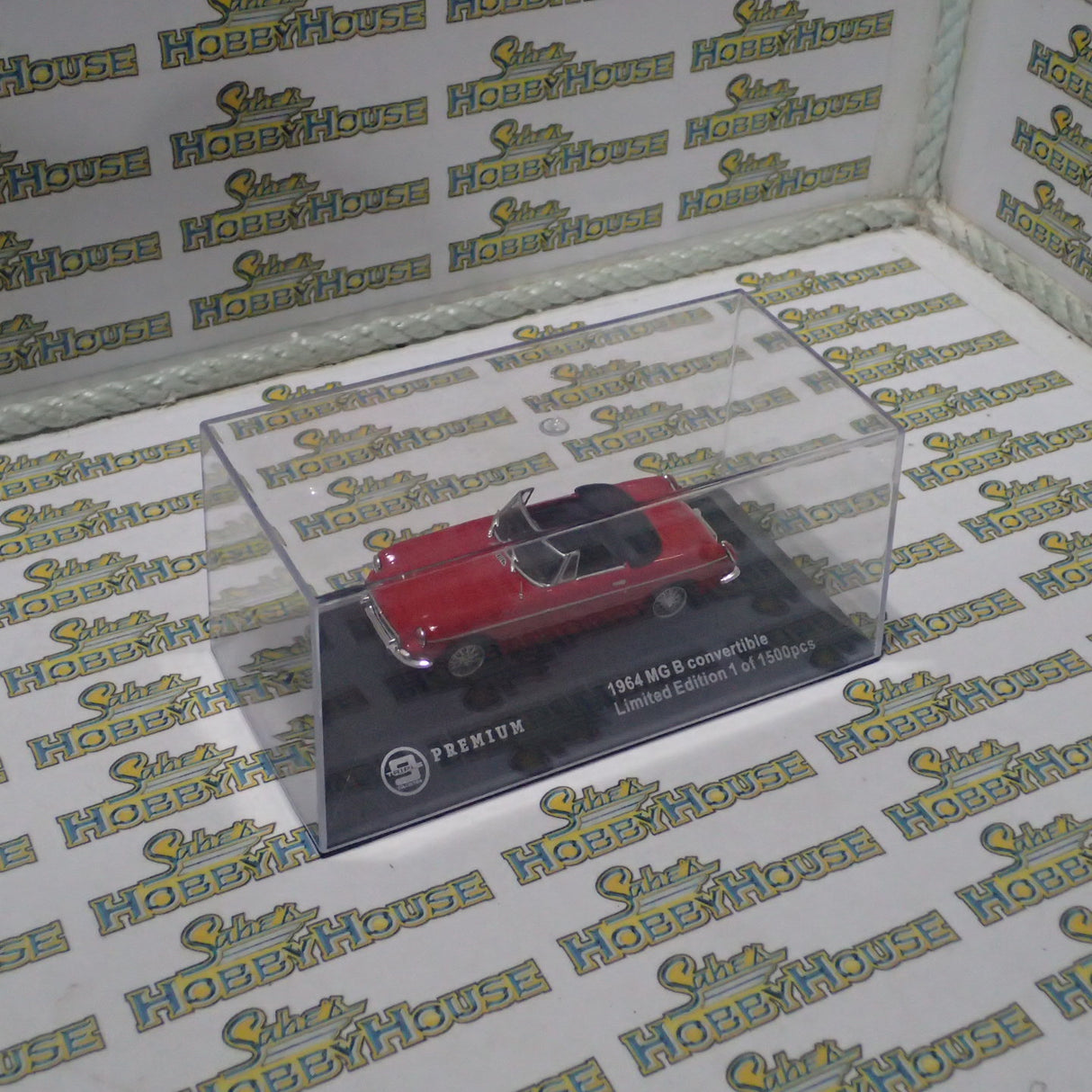 Triple 9 Collection T9P100001 - 1/43 Scale Premium Series Red 1964 MG B Convertible Diecast Model Replica