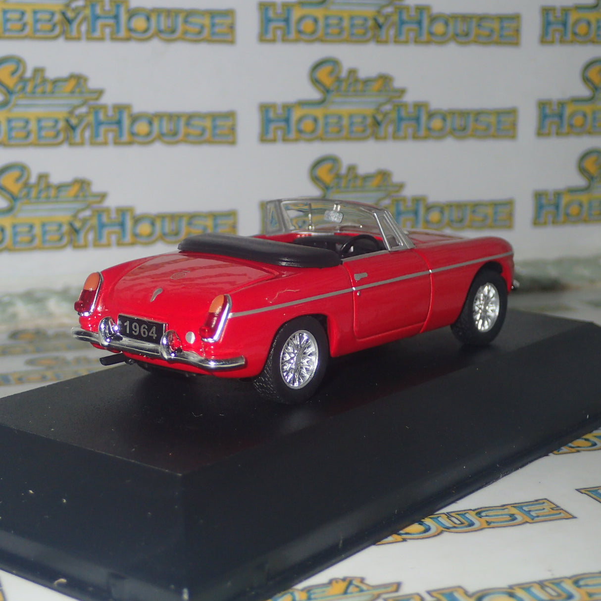 Triple 9 Collection T9P100001 - 1/43 Scale Premium Series Red 1964 MG B Convertible Diecast Model Replica