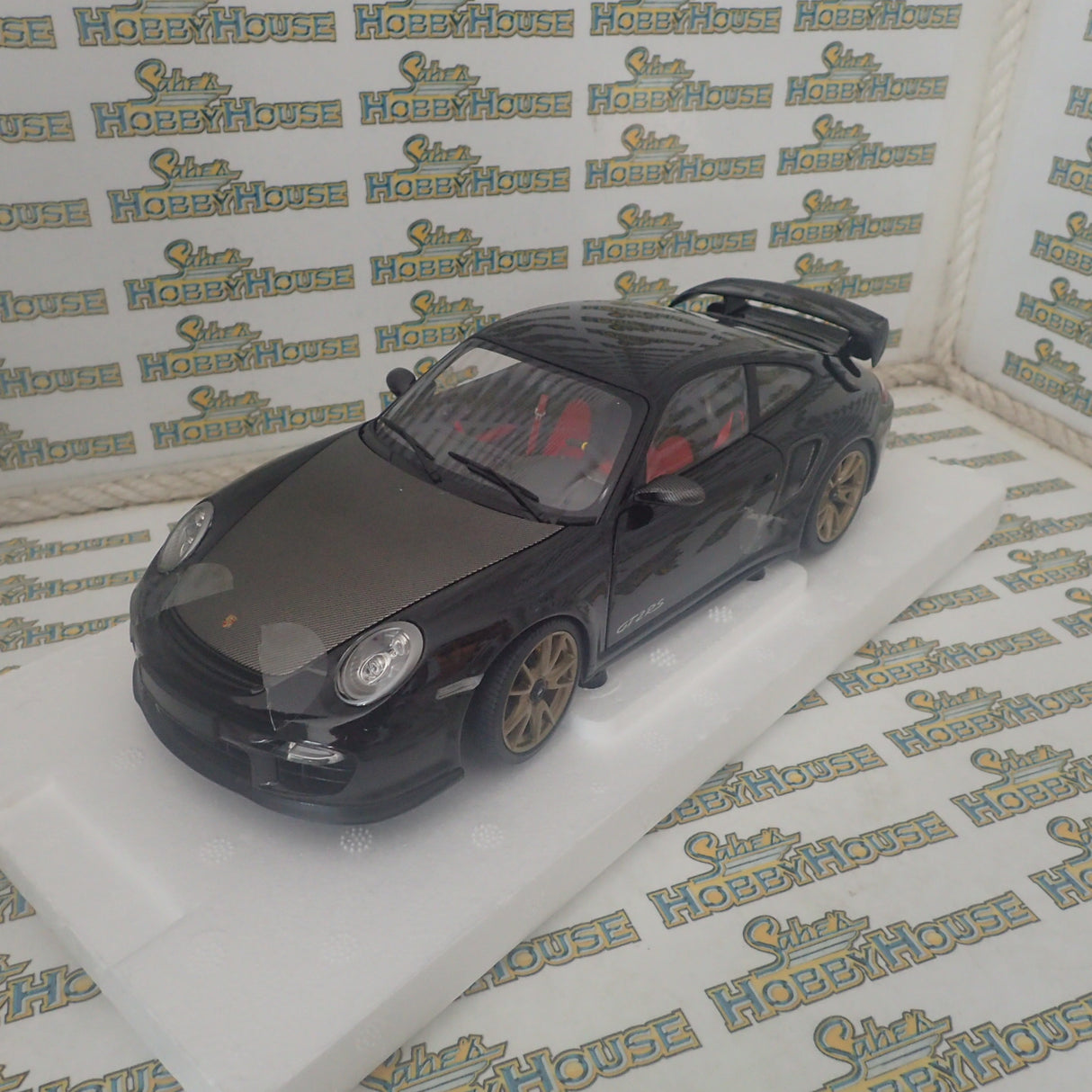 MINICHAMPS 100 069402 - 1/18 SCALE Diecast PORSCHE 911 (997 II) GT2 RS 2011 BLACK W/ GOLD WHEELS