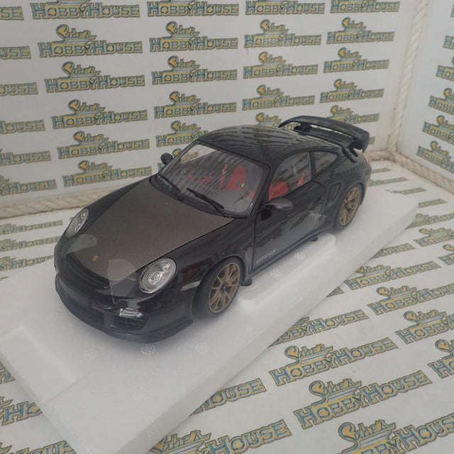 MINICHAMPS 100 069402 - 1/18 SCALE Diecast PORSCHE 911 (997 II) GT2 RS 2011 BLACK W/ GOLD WHEELS