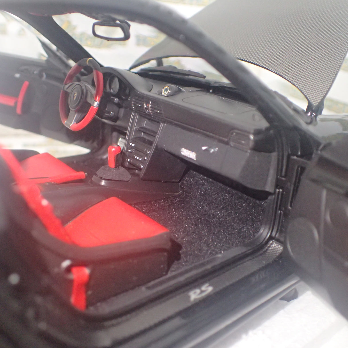 MINICHAMPS 100 069402 - 1/18 SCALE Diecast PORSCHE 911 (997 II) GT2 RS 2011 BLACK W/ GOLD WHEELS