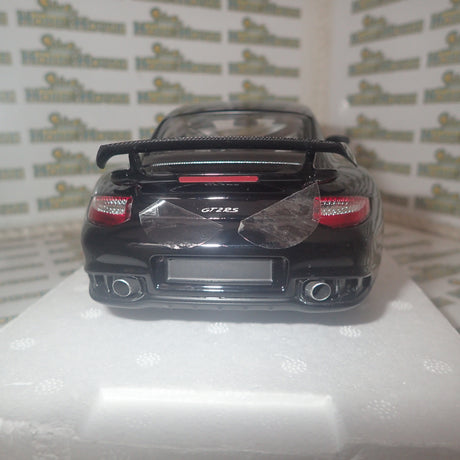 MINICHAMPS 100 069402 - 1/18 SCALE Diecast PORSCHE 911 (997 II) GT2 RS 2011 BLACK W/ GOLD WHEELS