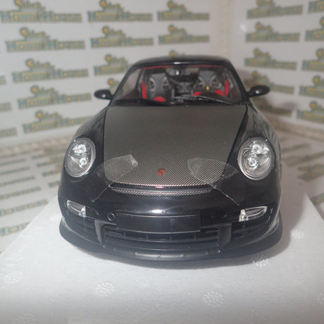MINICHAMPS 100 069402 - 1/18 SCALE Diecast PORSCHE 911 (997 II) GT2 RS 2011 BLACK W/ GOLD WHEELS