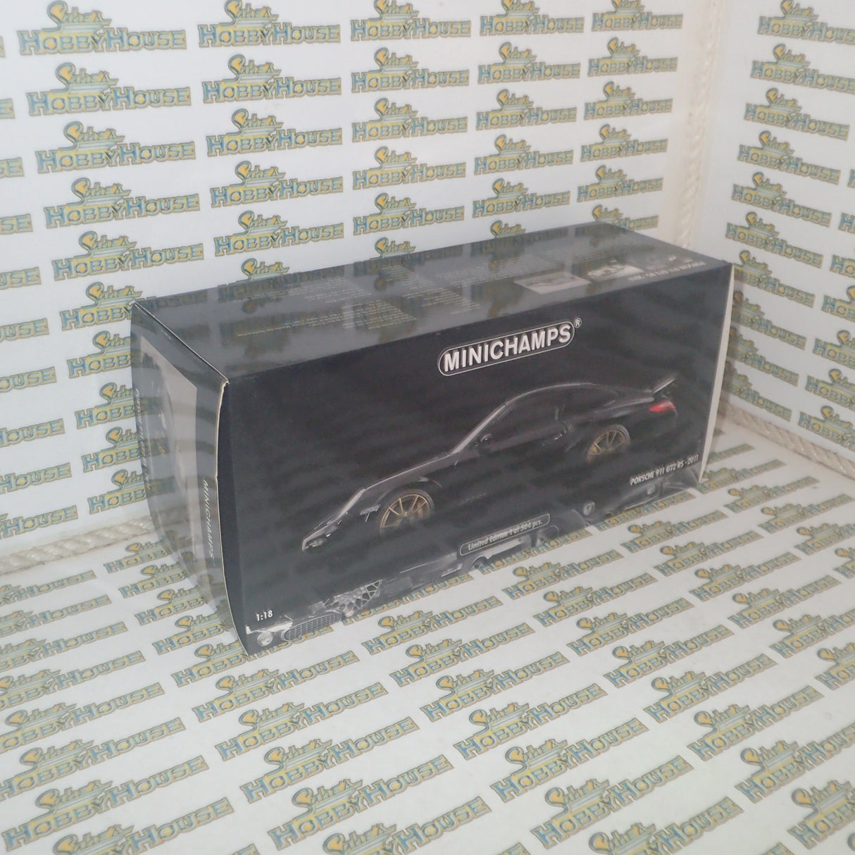 MINICHAMPS 100 069402 - 1/18 SCALE Diecast PORSCHE 911 (997 II) GT2 RS 2011 BLACK W/ GOLD WHEELS
