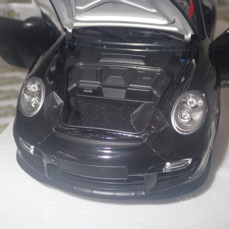 MINICHAMPS 100 069402 - 1/18 SCALE Diecast PORSCHE 911 (997 II) GT2 RS 2011 BLACK W/ GOLD WHEELS