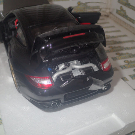 MINICHAMPS 100 069402 - 1/18 SCALE Diecast PORSCHE 911 (997 II) GT2 RS 2011 BLACK W/ GOLD WHEELS