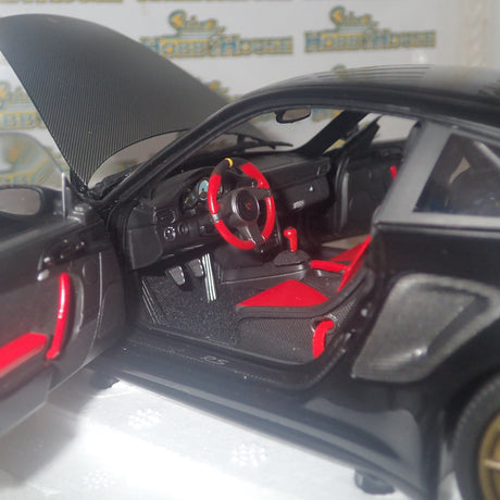 MINICHAMPS 100 069402 - 1/18 SCALE Diecast PORSCHE 911 (997 II) GT2 RS 2011 BLACK W/ GOLD WHEELS