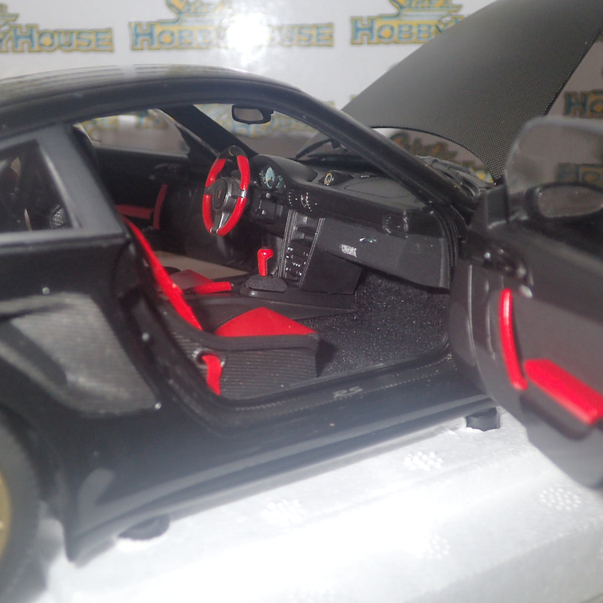 MINICHAMPS 100 069402 - 1/18 SCALE Diecast PORSCHE 911 (997 II) GT2 RS 2011 BLACK W/ GOLD WHEELS