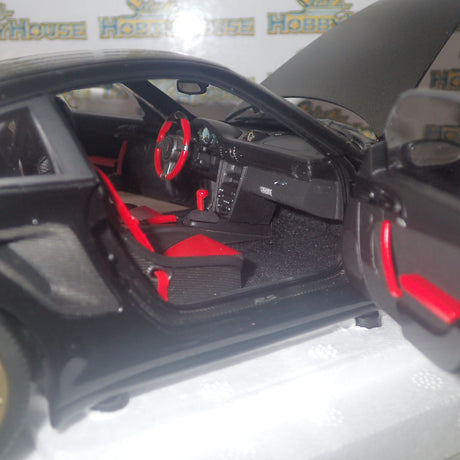 MINICHAMPS 100 069402 - 1/18 SCALE Diecast PORSCHE 911 (997 II) GT2 RS 2011 BLACK W/ GOLD WHEELS