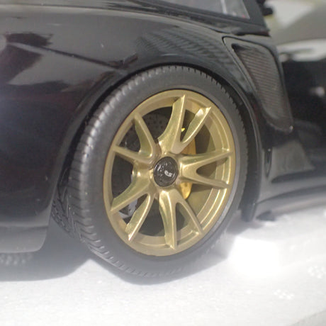 MINICHAMPS 100 069402 - 1/18 SCALE Diecast PORSCHE 911 (997 II) GT2 RS 2011 BLACK W/ GOLD WHEELS