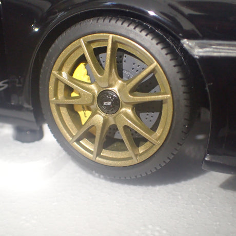 MINICHAMPS 100 069402 - 1/18 SCALE Diecast PORSCHE 911 (997 II) GT2 RS 2011 BLACK W/ GOLD WHEELS