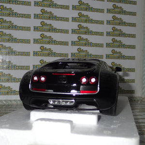 Minichamps 100 110842 - 1/18 Scale Bugatti Veyron Super Sport 2010 in Black Metallic with Orange Rims Diecast Scale Model Replica