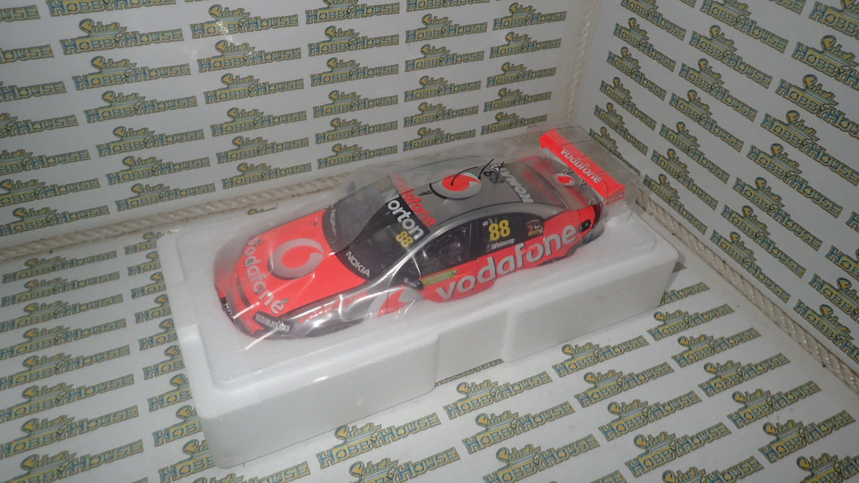 Classic Carlectables 18494 - 1/18 Scale Holden VE Series II Commodore Jamie Whinchup 2011 Championship Winner Team Vodafone #88 Diecast Model Replica