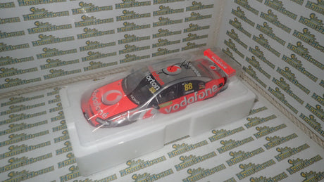 Classic Carlectables 18494 - 1/18 Scale Holden VE Series II Commodore Jamie Whinchup 2011 Championship Winner Team Vodafone #88 Diecast Model Replica