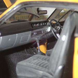 Classic Carlectables 18524 - 1:18 Chrysler VH Valiant E38 R/T Charger Hot Mustard "Small Tank" Die-cast Replica