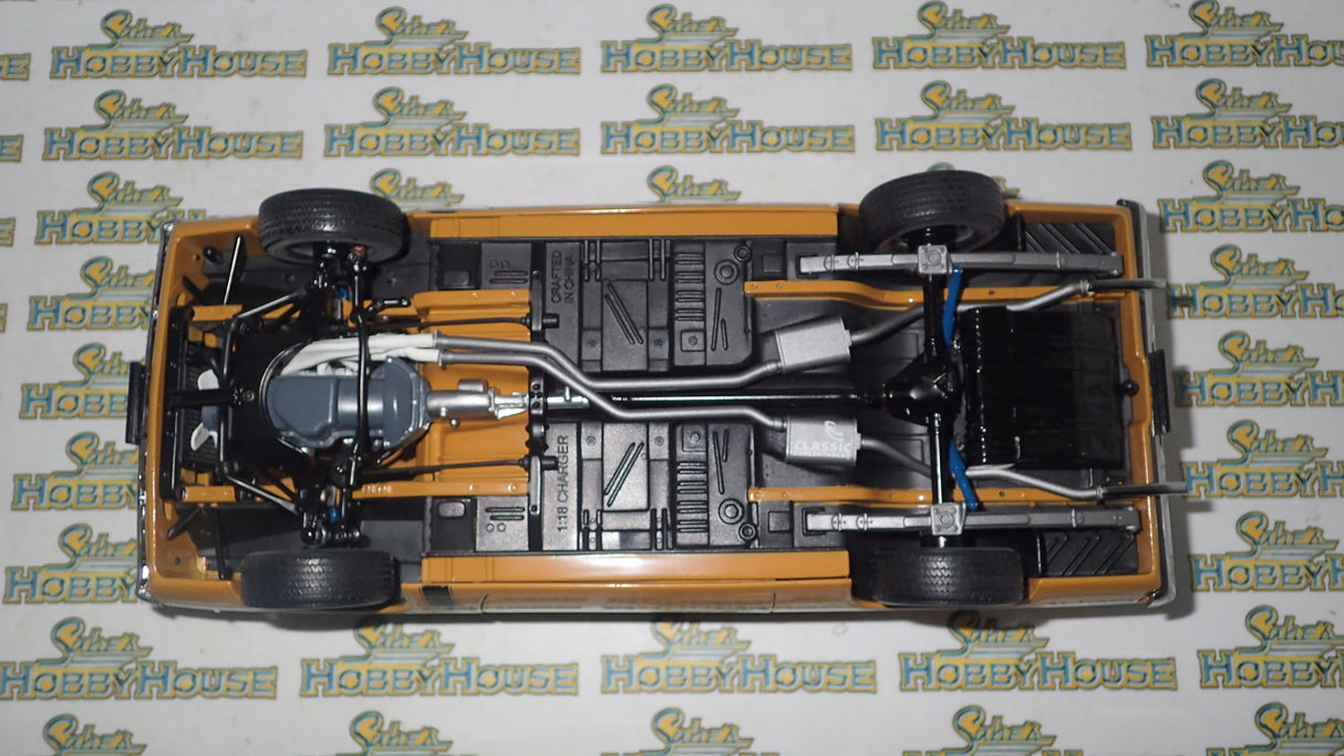 Classic Carlectables 18524 - 1:18 Chrysler VH Valiant E38 R/T Charger Hot Mustard "Small Tank" Die-cast Replica