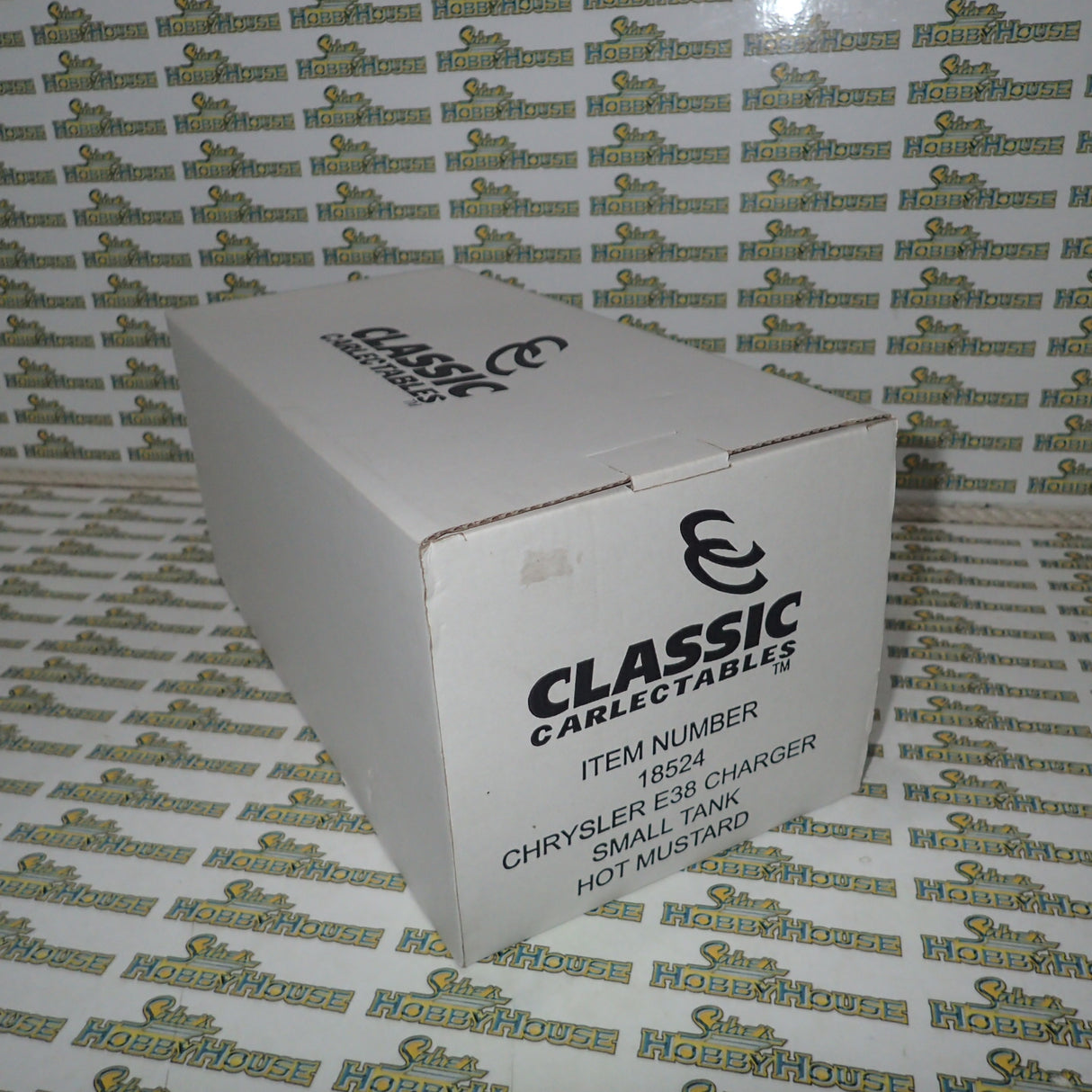 Classic Carlectables 18524 - 1:18 Chrysler VH Valiant E38 R/T Charger Hot Mustard "Small Tank" Die-cast Replica