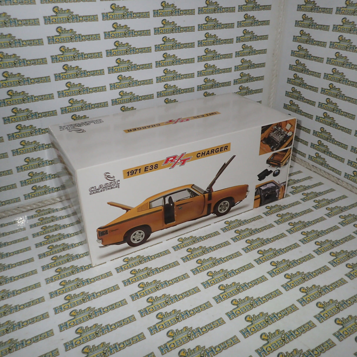 Classic Carlectables 18524 - 1:18 Chrysler VH Valiant E38 R/T Charger Hot Mustard "Small Tank" Die-cast Replica