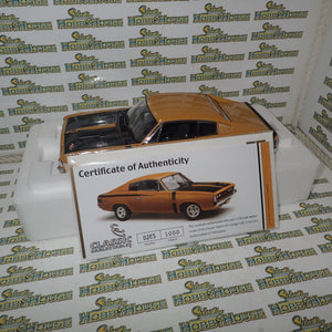 Classic Carlectables 18524 - 1:18 Chrysler VH Valiant E38 R/T Charger Hot Mustard "Small Tank" Die-cast Replica