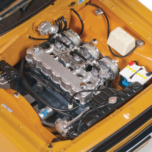 Classic Carlectables 18524 - 1:18 Chrysler VH Valiant E38 R/T Charger Hot Mustard "Small Tank" Die-cast Replica