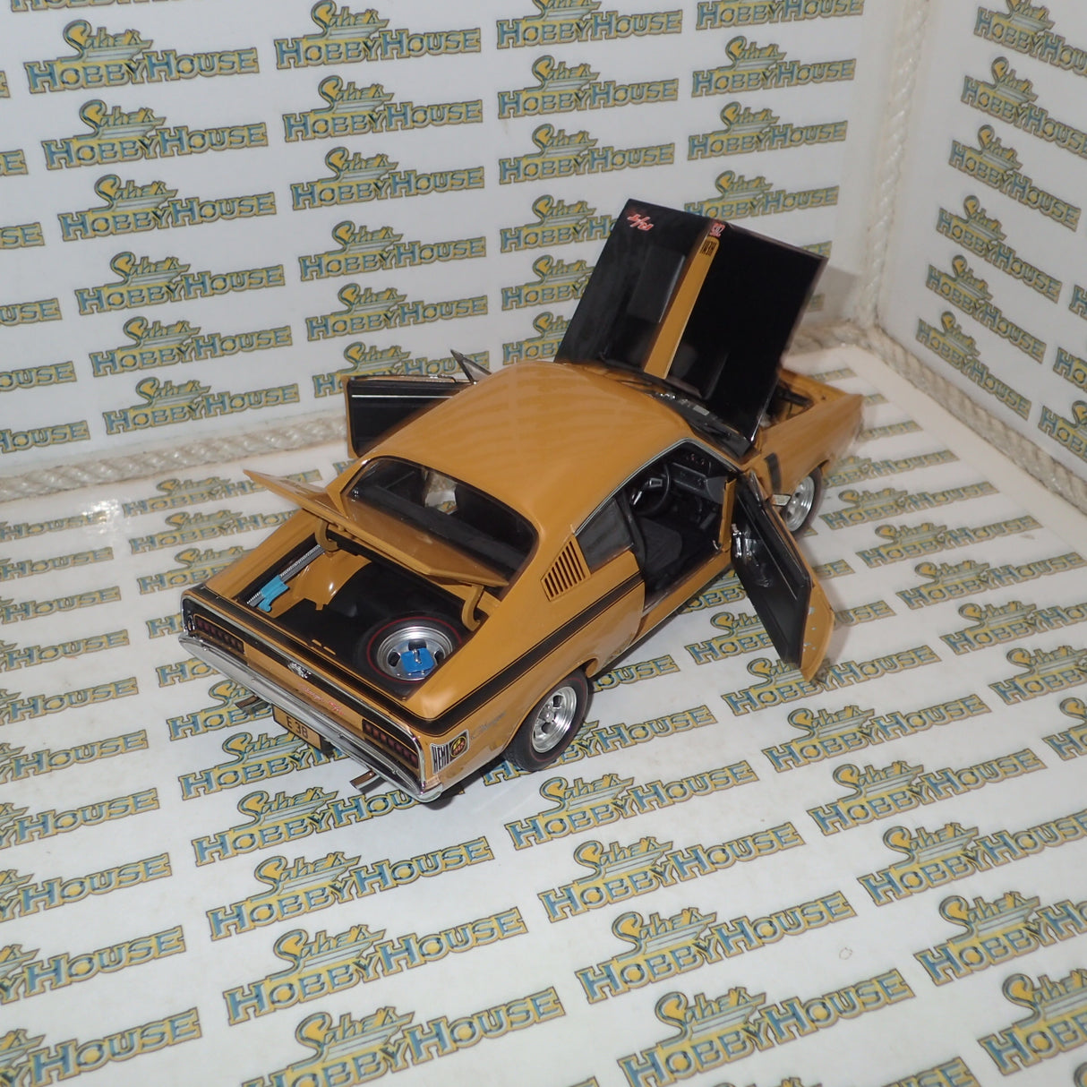 Classic Carlectables 18524 - 1:18 Chrysler VH Valiant E38 R/T Charger Hot Mustard "Small Tank" Die-cast Replica