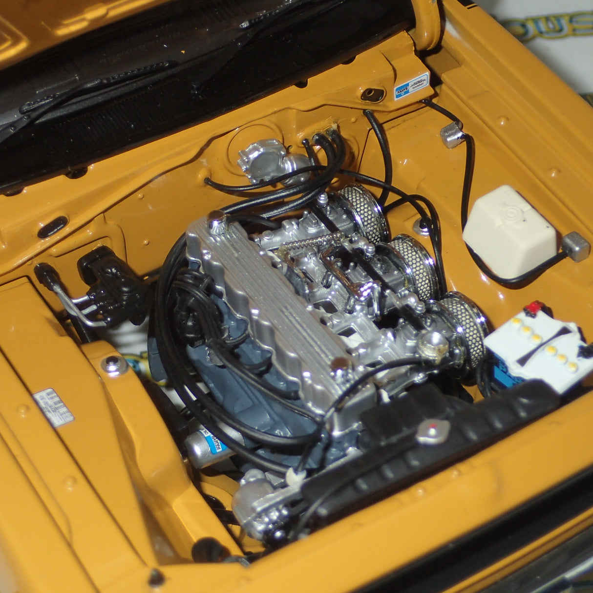 Classic Carlectables 18524 - 1:18 Chrysler VH Valiant E38 R/T Charger Hot Mustard "Small Tank" Die-cast Replica