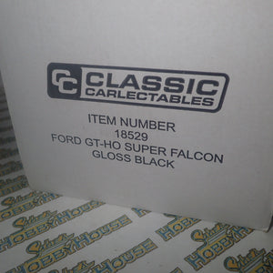CLASSIC CARLECTABLES 18529 - 1:18 SCALE FORD GT-HO SUPER FALCON GLOSS BLACK DIECAST REPLICA
