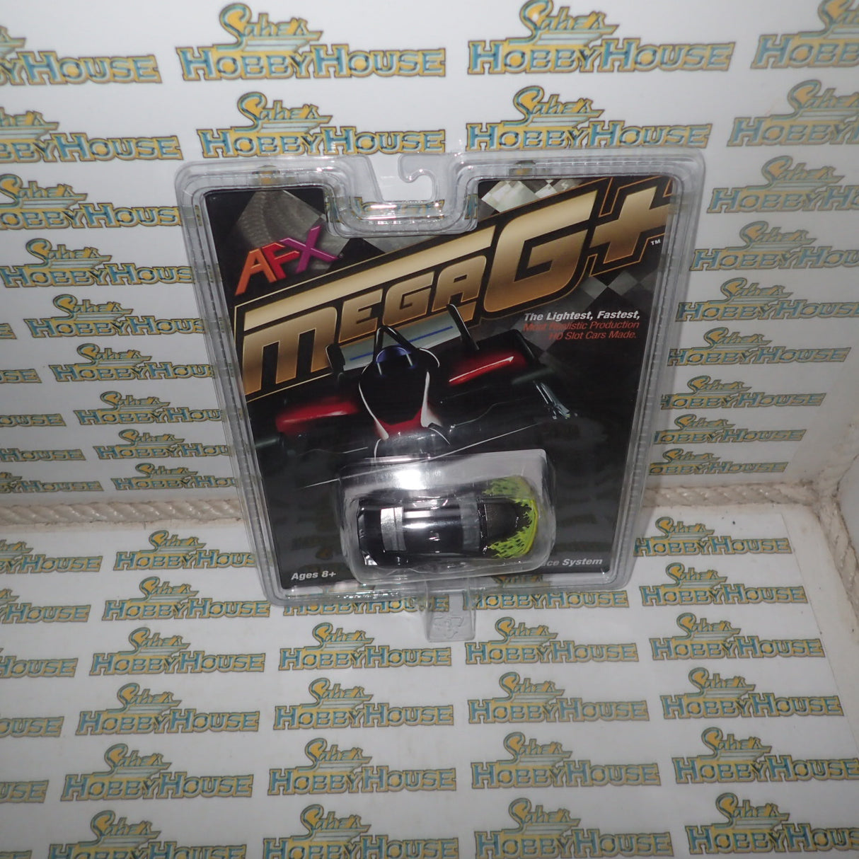 AFX 22060 – 1/64 Scale CAMARO 2021 WILDFIRE BLK/LIM