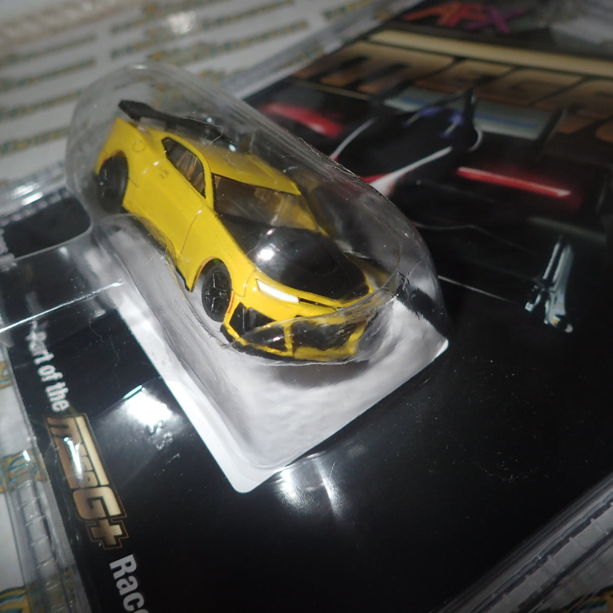 AFX 22075 – 1/64 Scale 2021 ZL1 CAMARO 1LE SHOCK YELLOW