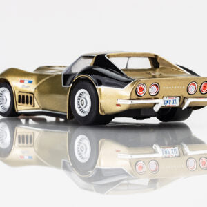 AFX 22093 - 1/64 Scale ASTROVETTE 1969 LMP 12 GLD/BLK LTD