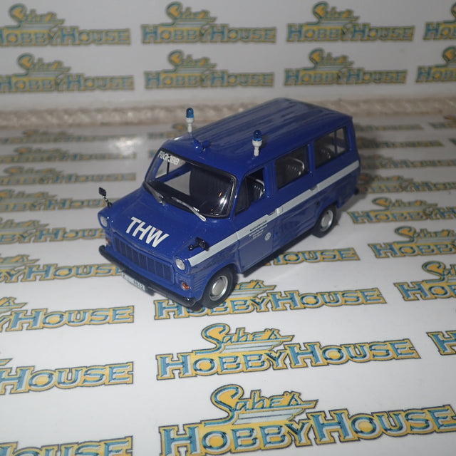 Minichamps 400 082491 - 1/43 Scale - Ford Transit 1977 Bus "THW Koin-Nord" Diecast Model Replica