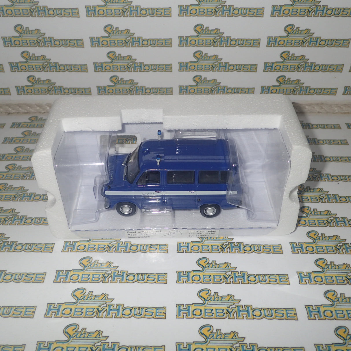 Minichamps 400 082491 - 1/43 Scale - Ford Transit 1977 Bus "THW Koin-Nord" Diecast Model Replica