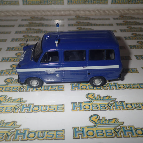 Minichamps 400 082491 - 1/43 Scale - Ford Transit 1977 Bus "THW Koin-Nord" Diecast Model Replica