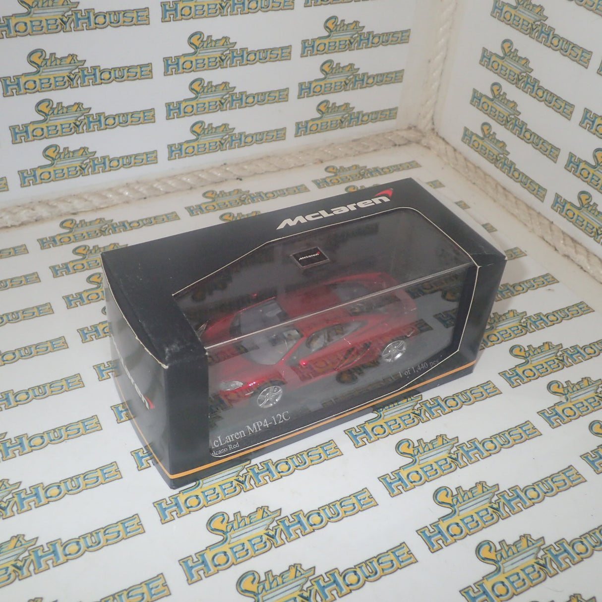 Minichamps 530 133022 - 1/43 Scale McLaren MP4-12C in Volcano Red Metallic Diecast Model Replica