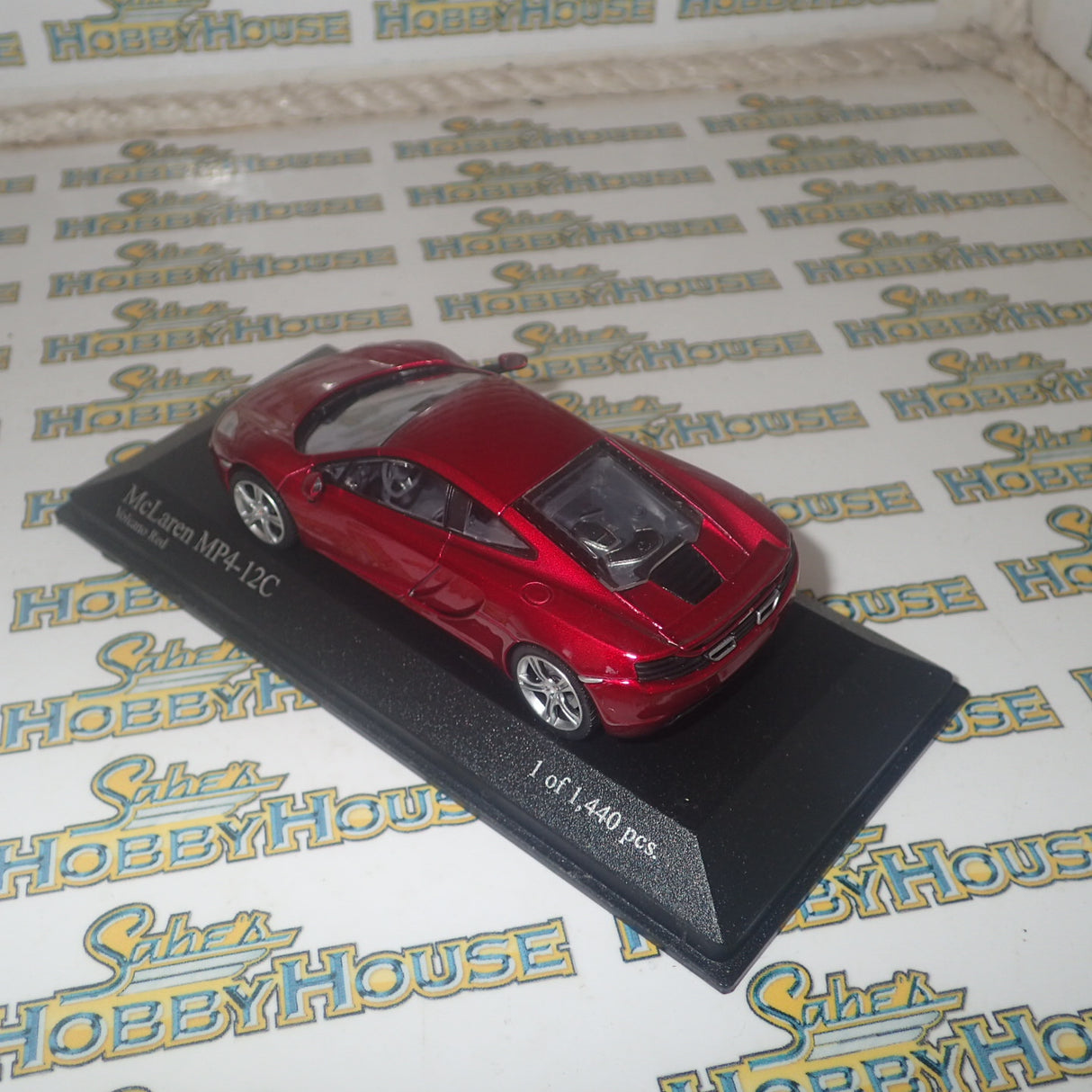 Minichamps 530 133022 - 1/43 Scale McLaren MP4-12C in Volcano Red Metallic Diecast Model Replica