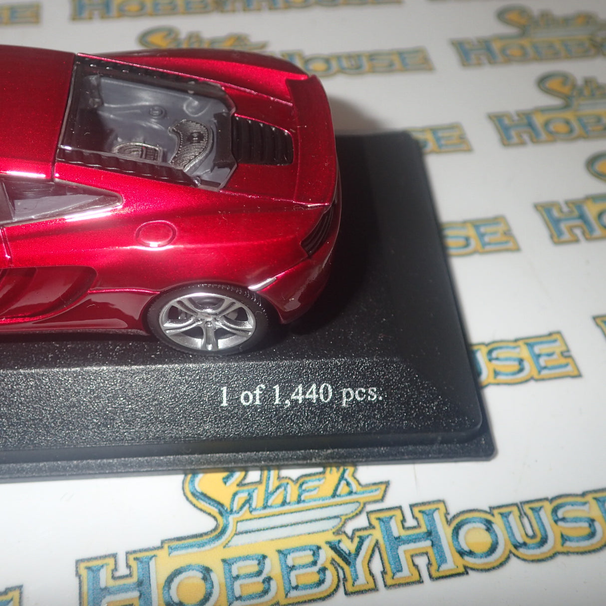 Minichamps 530 133022 - 1/43 Scale McLaren MP4-12C in Volcano Red Metallic Diecast Model Replica