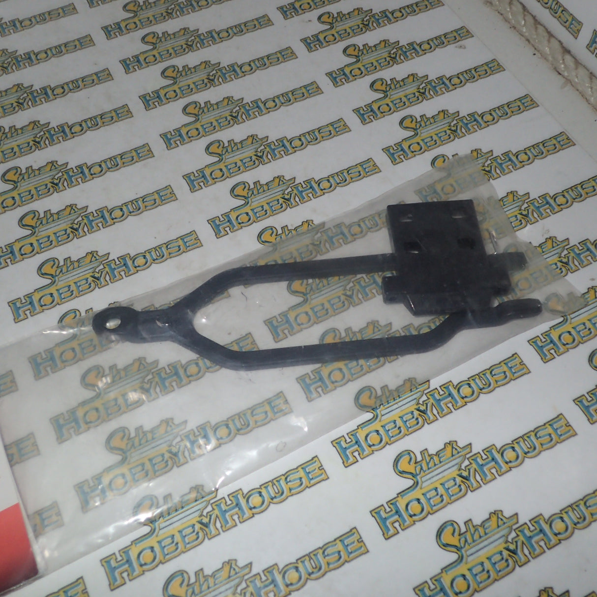 Traxxas - #6727X Hold down, battery/ hold down retainer/ battery post/ angled body clip (allows for installation of taller, multi-cell batteries)