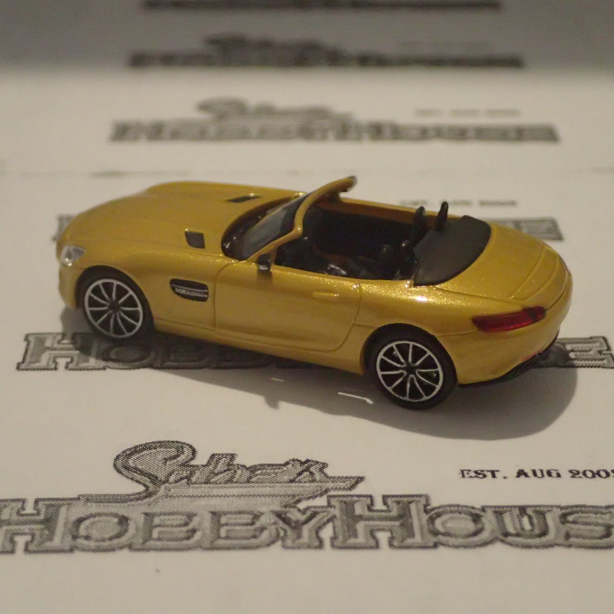 Minichamps - 870 037132 1/87 Scale - Mercedes AMG GTS Roadster 2015 Yellow Metallic