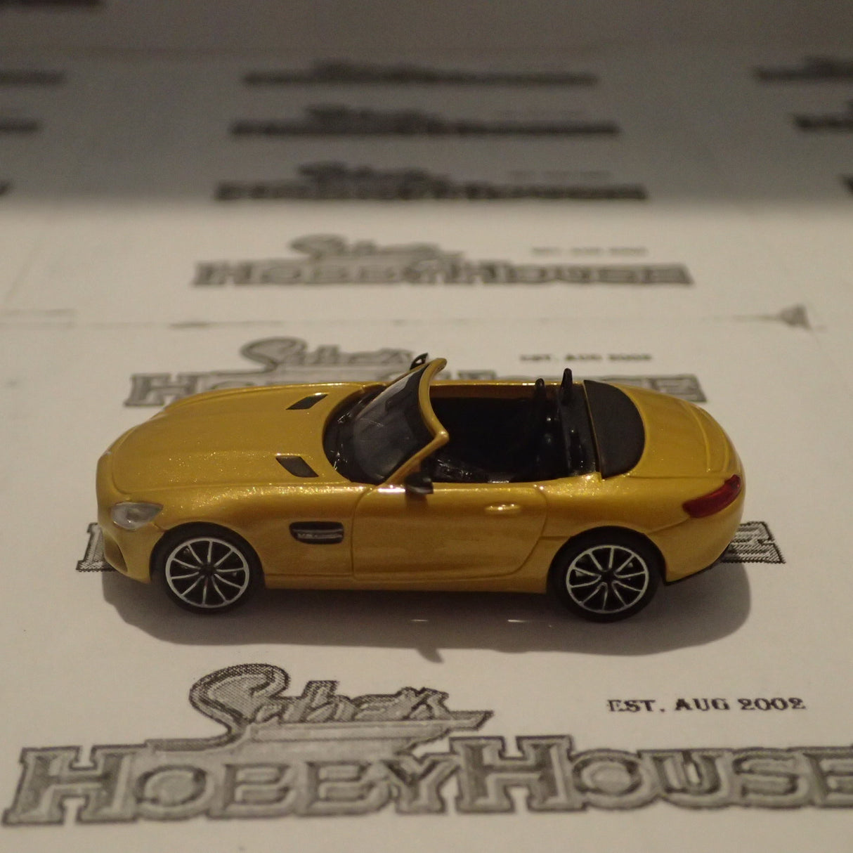 Minichamps - 870 037132 1/87 Scale - Mercedes AMG GTS Roadster 2015 Yellow Metallic
