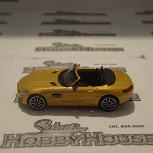 Minichamps - 870 037132 1/87 Scale - Mercedes AMG GTS Roadster 2015 Yellow Metallic