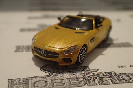 Minichamps - 870 037132 1/87 Scale - Mercedes AMG GTS Roadster 2015 Yellow Metallic