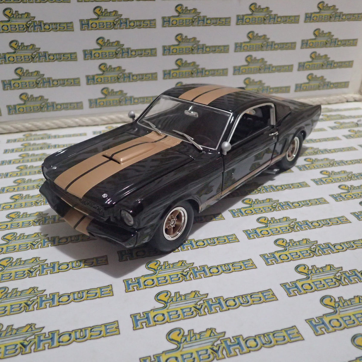 ACME A1801827 - 1/18 Scale #314 1966 Shelby GT350H Rent A Racer Black & Gold Custom Diecast Scale Model Replica
