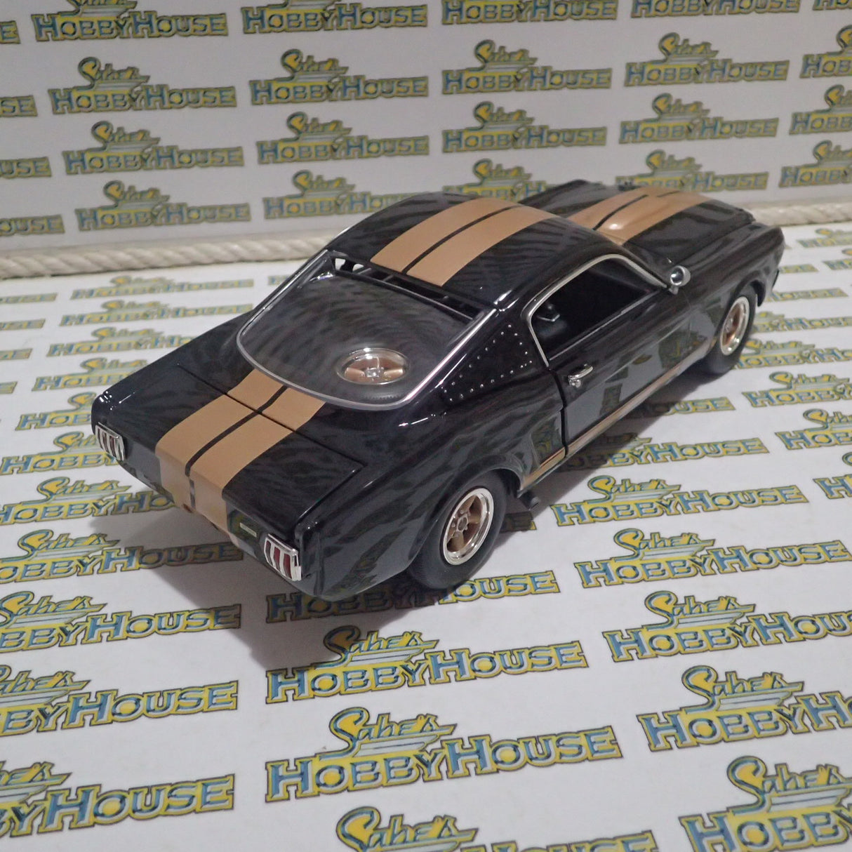 ACME A1801827 - 1/18 Scale #314 1966 Shelby GT350H Rent A Racer Black & Gold Custom Diecast Scale Model Replica